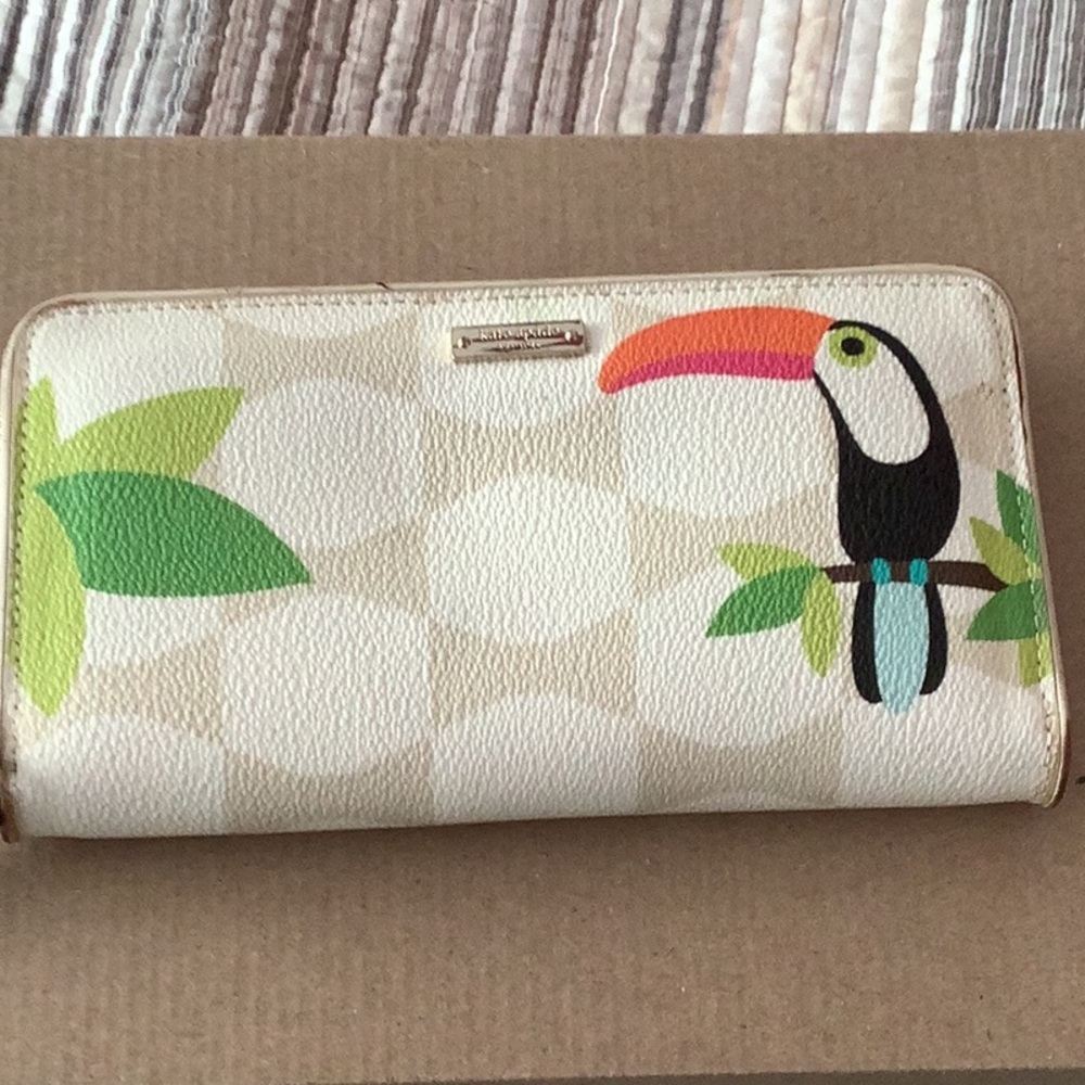 Kate spade wallet with 12 credit card slots 2 bill slots and zip compartment